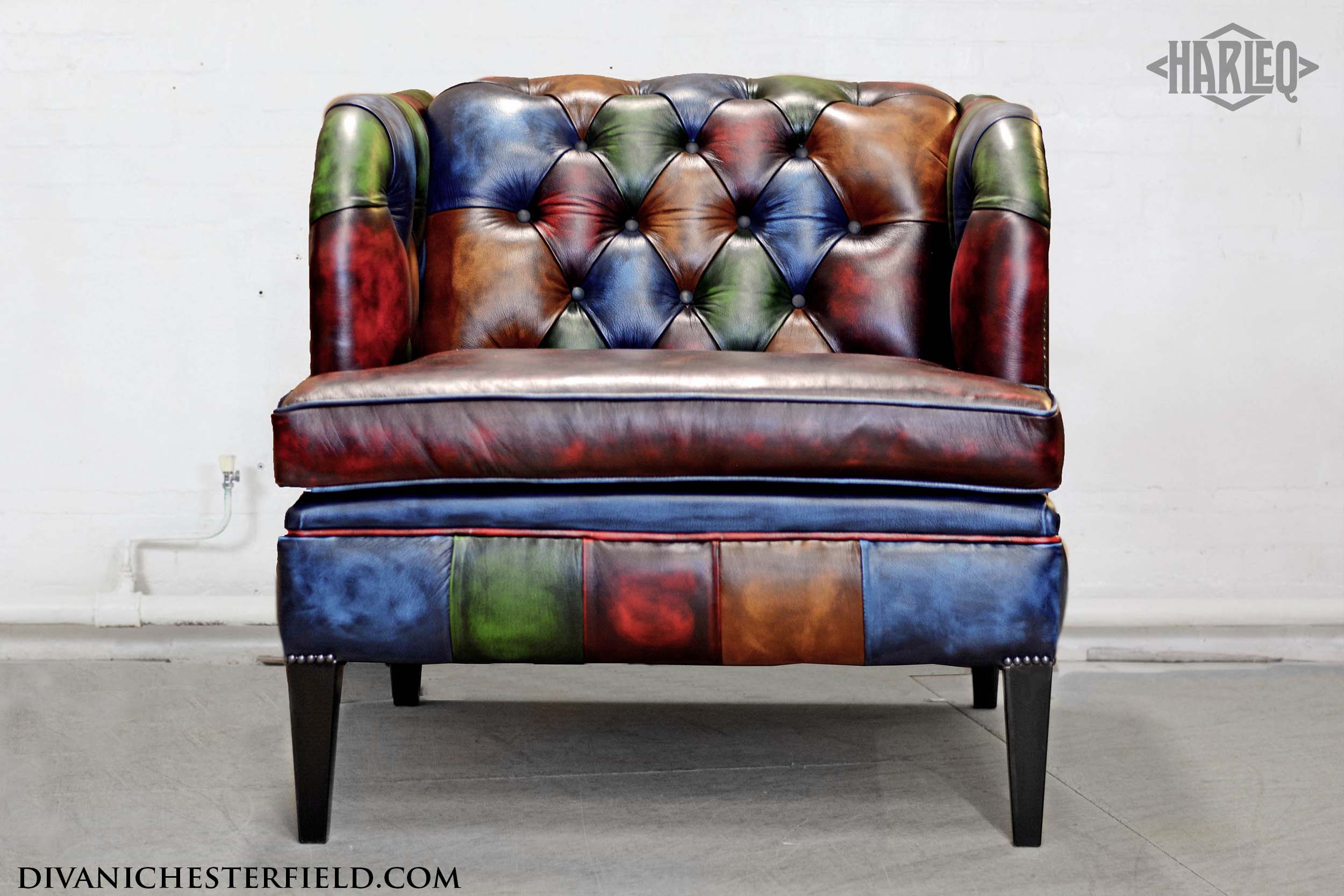 poltrona moderna in varie pelli patchwork imbottita bottoni