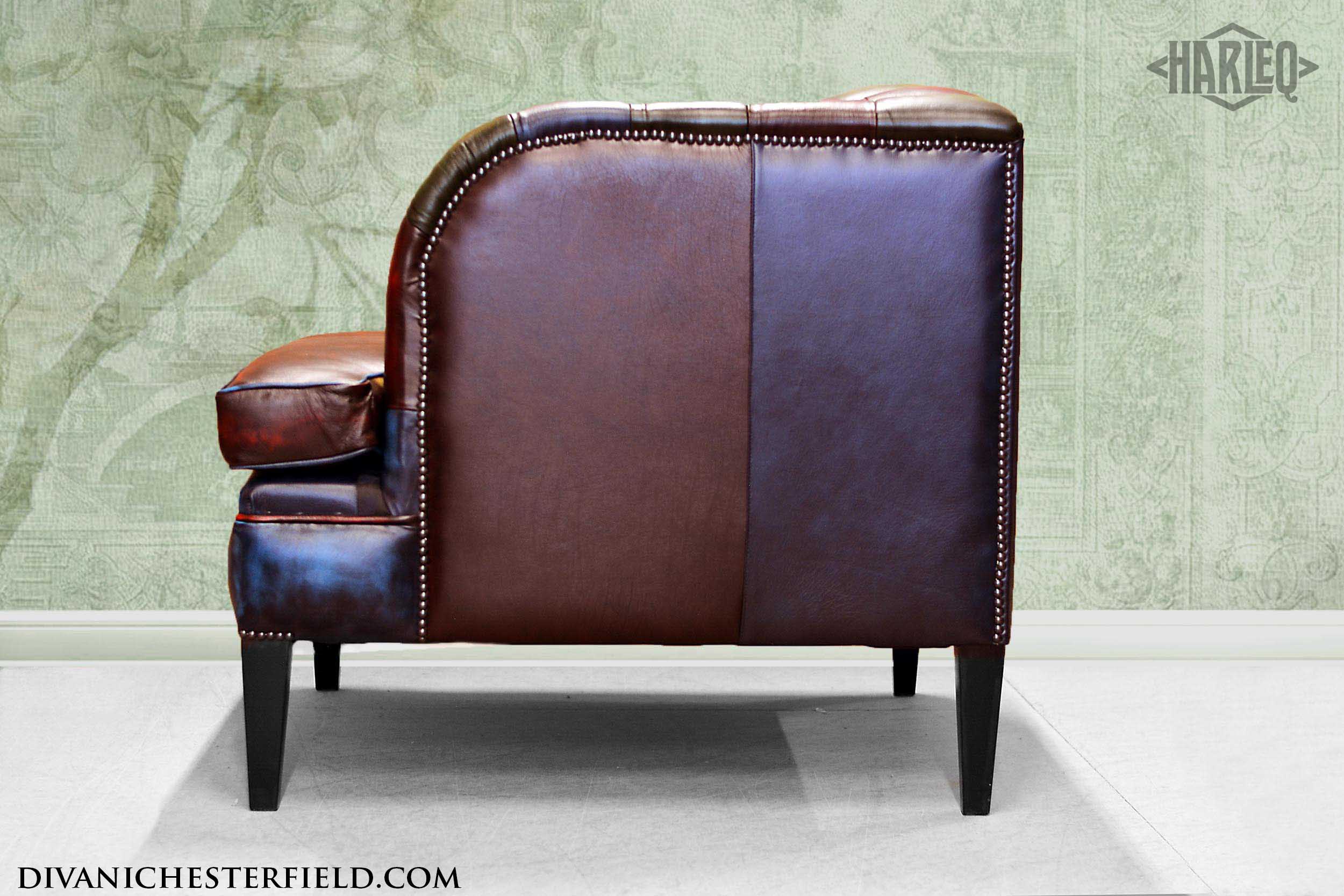 poltrona moderna in varie pelli patchwork imbottita bottoni